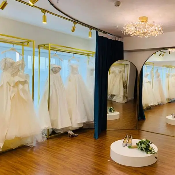 

Wedding dress rack, elevated gold display rack, floor hanger, wedding dress shop, studio, cheongsam dress rack