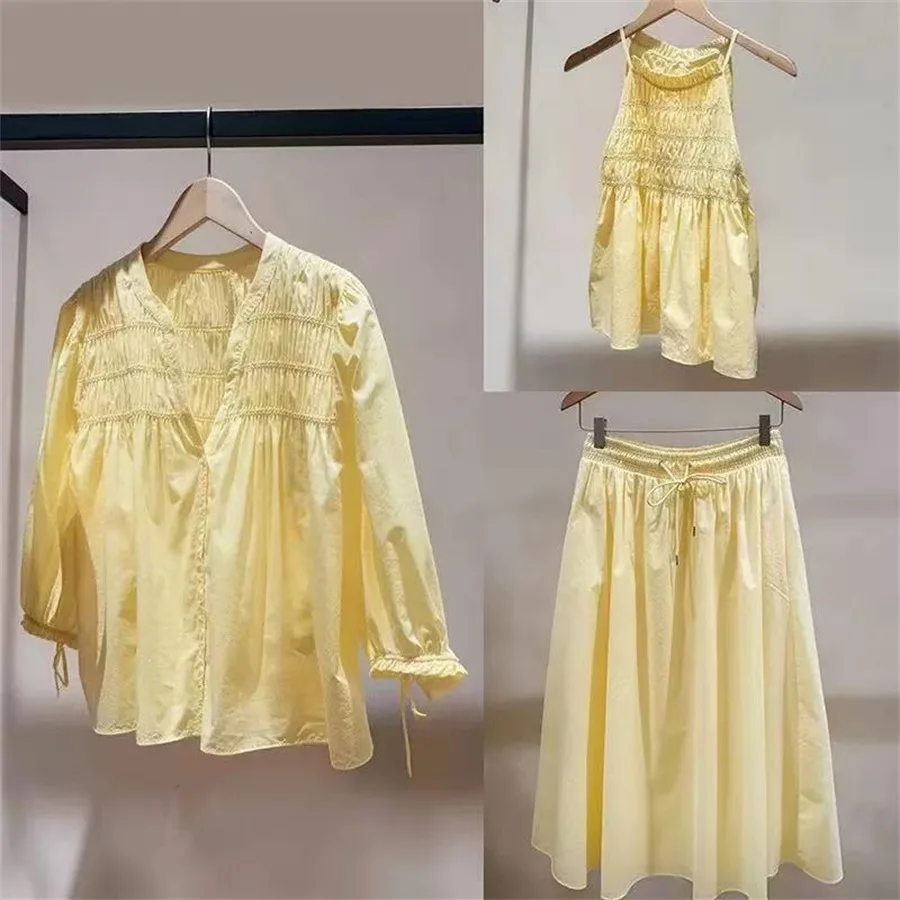 

Spring Summer New Holiday Bright Yellow Neck Hanging Strap Pleated Shirt Half Skirt Casual Set Women's Fashion Bubble Sleeve