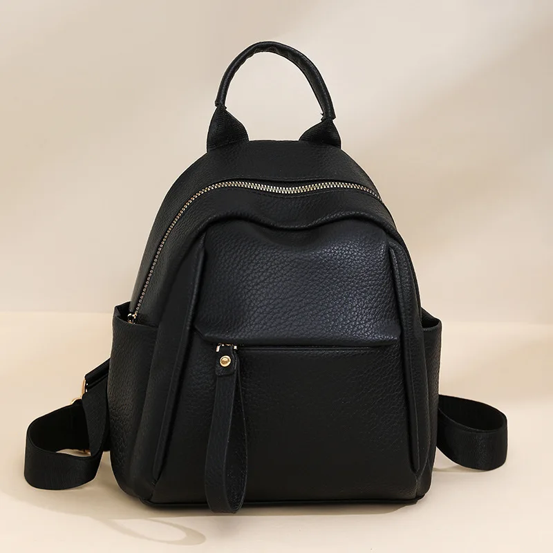 Litchi Pattern Leather Backpack Compact Casual Rucksack with Top Handle Adjustable Straps Ideal for Work, School, Weekend Trips