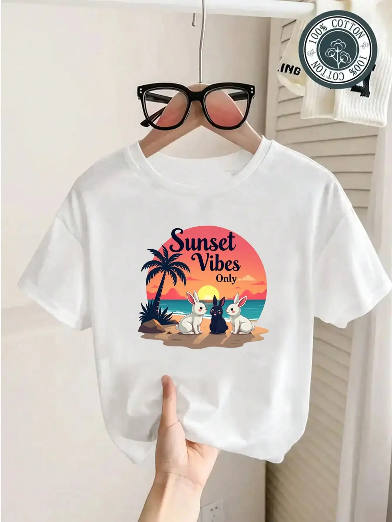 

Youngsters' Sunset Vibes Cotton T-Shirt, White Tee With Rabbits And Palm Trees, Comfy & Cute Beach Art Print Tops