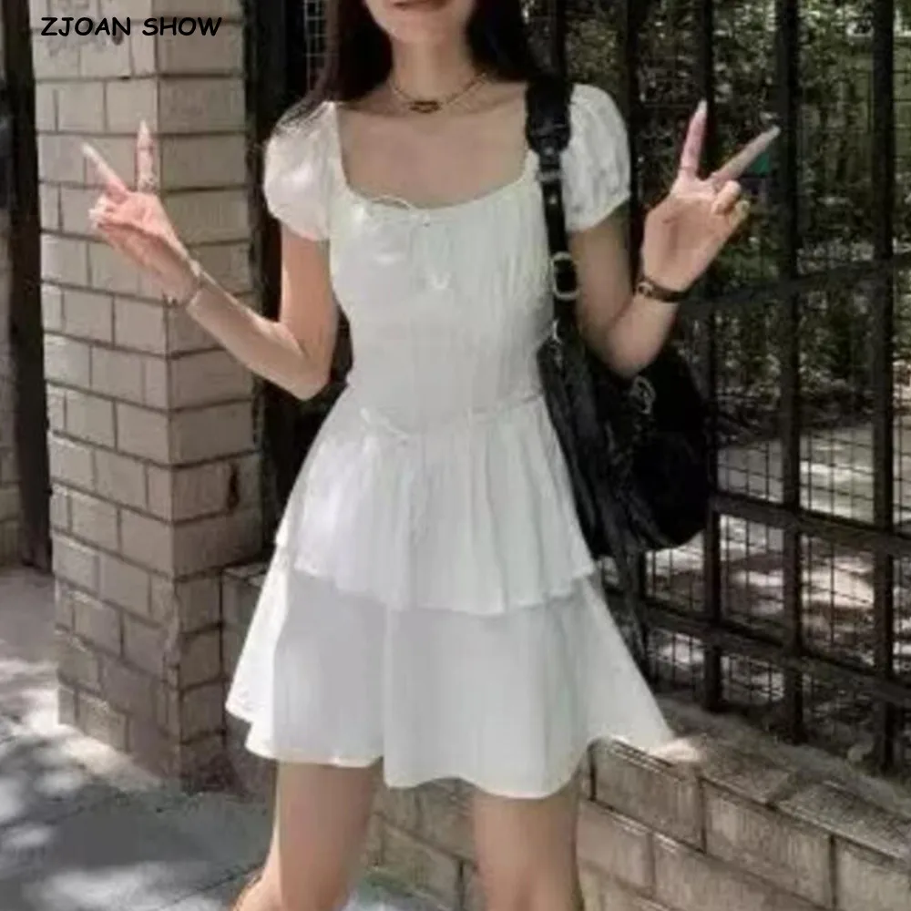 2025 francês retro branco arco gola quadrada manga curta mini vestido feminino orelhas de madeira cintura fina 2 camadas bainha vestidos férias robe