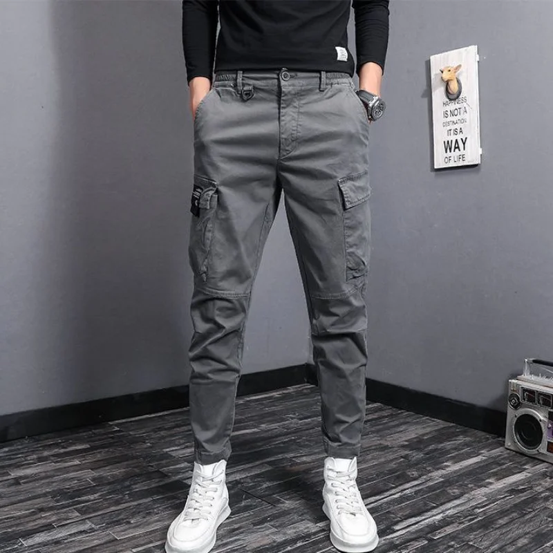Chaopai Fashion Solid Color Multiple Pockets Męskie spodnie Cargo Wysokiej jakości spodnie męskie z prostym cylindrem na guziki