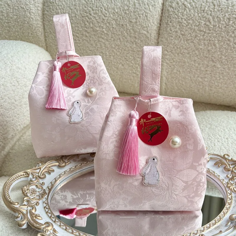 

10 шт., подарочный пакет с китайским лунным кроликом, текстильные поделки, изысканная упаковка, сумки для конфет, принадлежности для детского душа, вечеринки