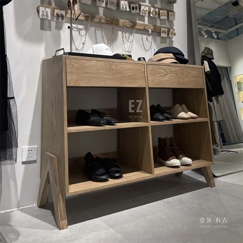 Wooden shelf against the wall Display cabinet Shoe shelf Display cabinet