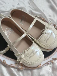 Oryginalne płaskie buty Kawaii Sweet Style Women New Japanese Cute Round Head Shoes Female Bow Letters Design Lolita Single Shoes