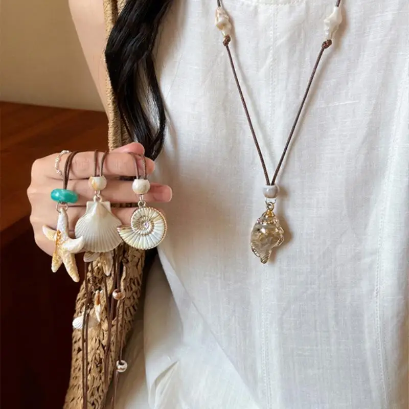 Seestern-Muschel-Perlen-Halskette aus Wachsseil für Frauen, Bohemian-Strand-Urlaubsstil, Schlüsselbeinkette, modischer Alltagsschmuck – Detail 1