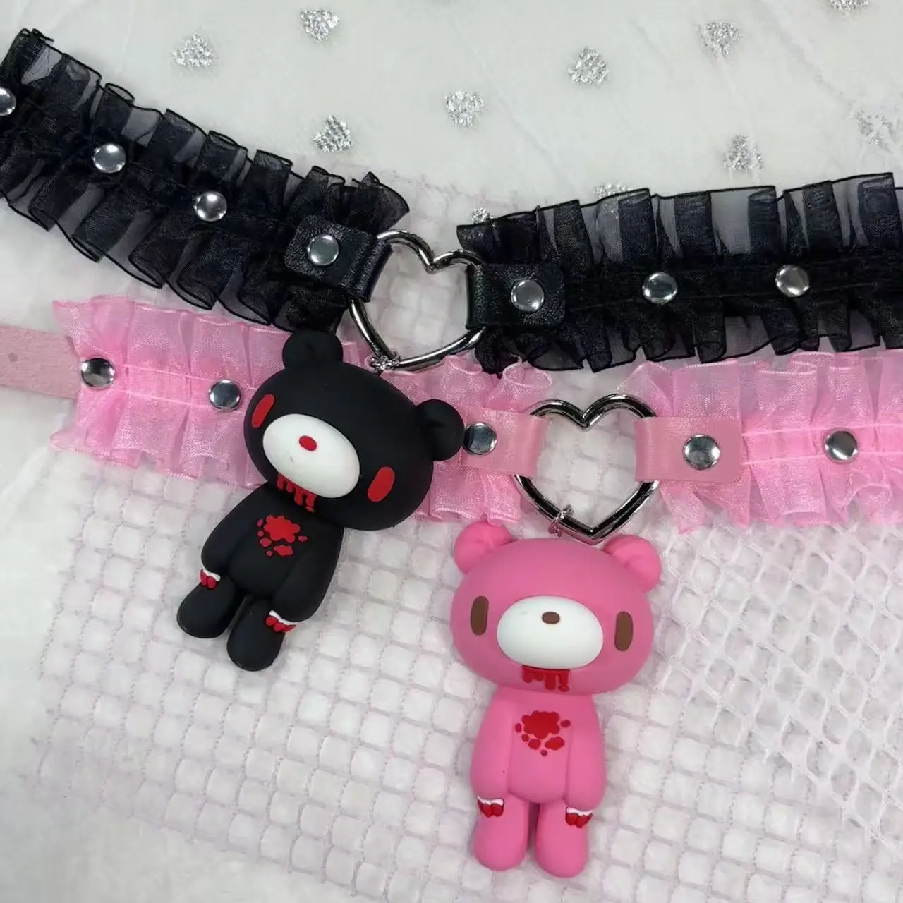 Edgy Bloody Bear Choker Necklaces - Black/pink ruffled collars with heart details and dark bear pendants. Bold alternative style