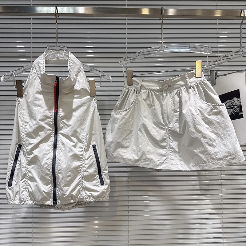 

Spring and Autumn Female New Trendy Spicy Girl Zipper Backless Hanging Neck Vest+high Waist Mini Skirt Women Two-piece Set