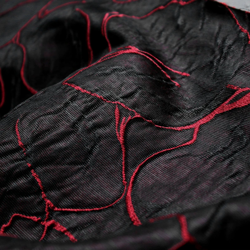 Tessuto a righe tridimensionali jacquard nero e rosso con struttura in rilievo tessuto di design di abbigliamento cheongsam di fascia alta
