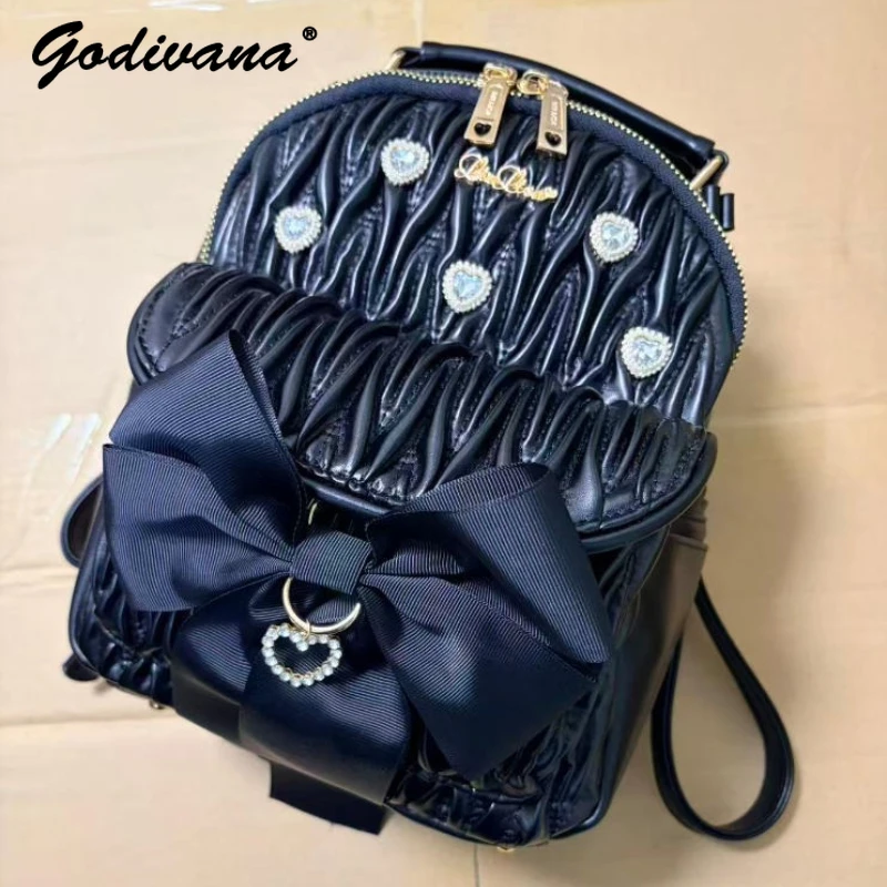 

Japanese Liz Mass-Produced Portable Black Backpack with Rhinestone Pearl Bow Lolita Girl Women's Lolita Leather Shoulder Bags