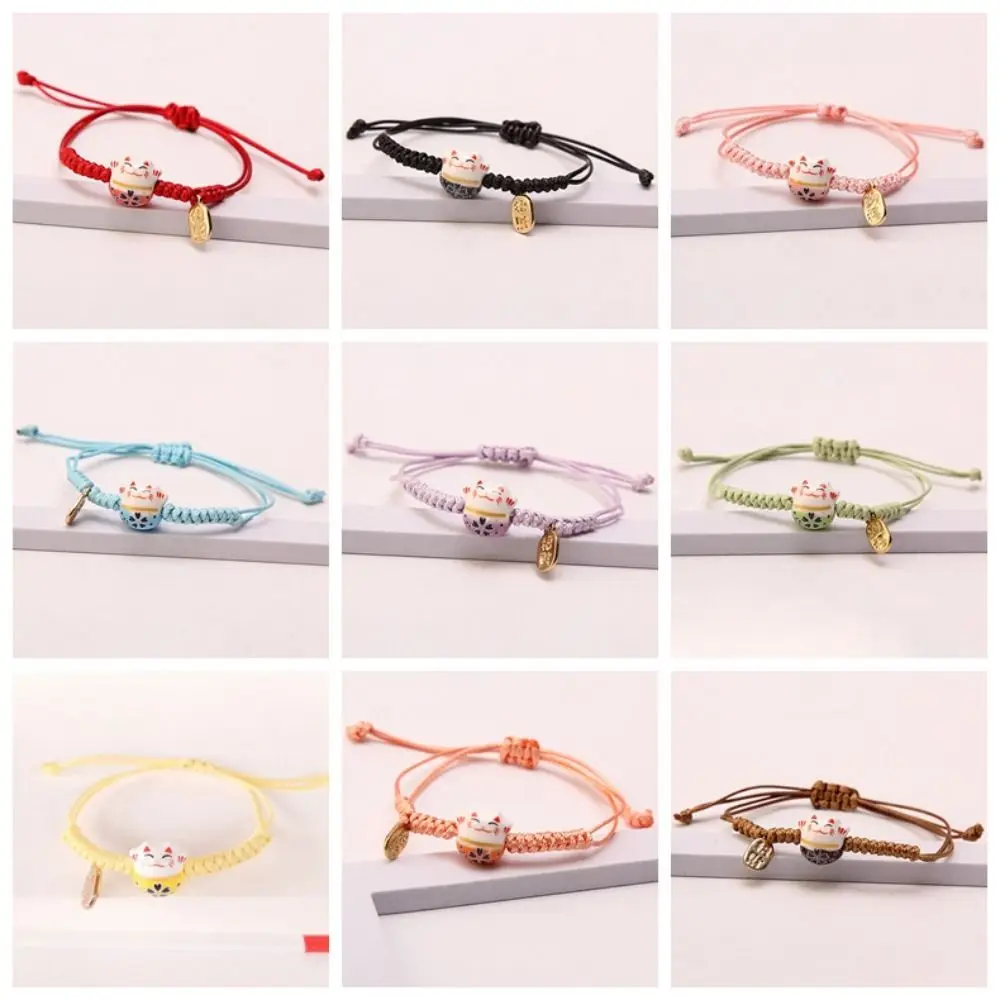 السيراميك القط قلادة Maneki Neko سوار اليدوية اليد حبل أحمر حبل مضفر النمط الصيني مجوهرات اكسسوارات النساء اليد الدائري