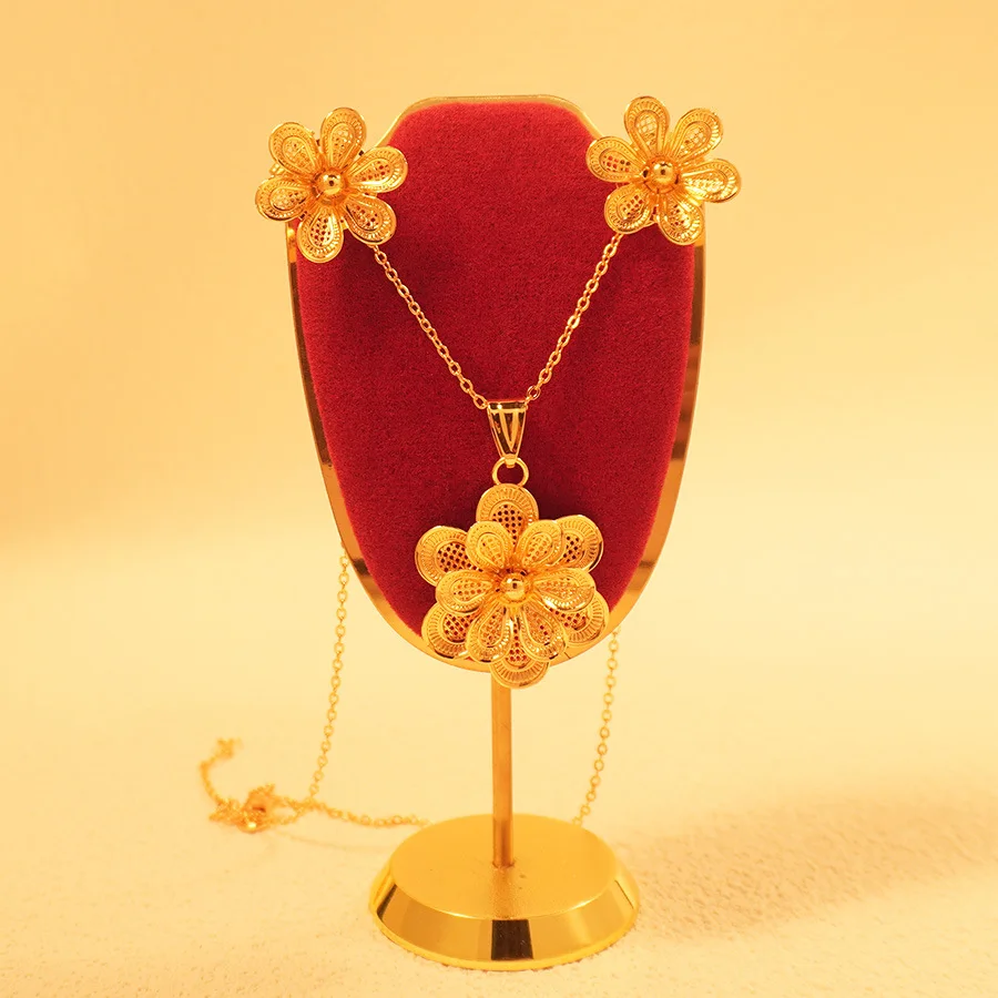 9999 gold love jewelry from a Middle Eastern Dubai lady - floral design necklace and earrings, perfect for back-to-school gifts