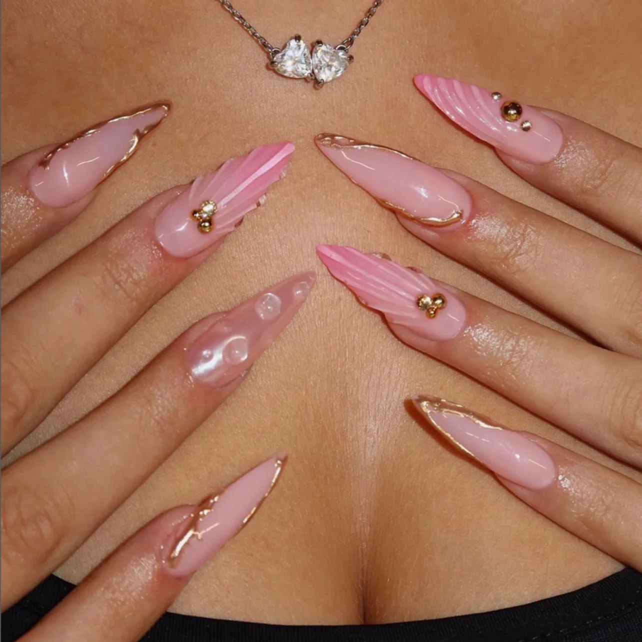 

24Pcs Long Stiletto Fake Nails Press on 3D Shell Irregular Metal Design Full Cover Nails Tips Pink Smudge Detachable False Nails