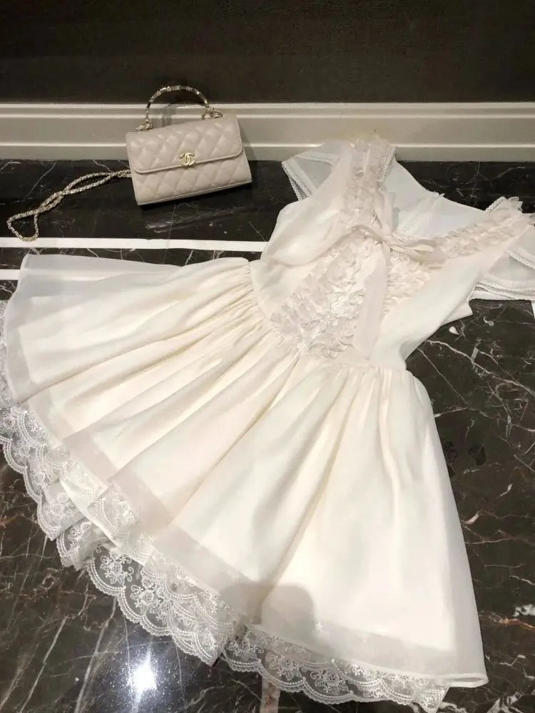 فستان الأميرة الحلو الصيفي الفرنسي الأنيق للنساء بأكمام قصيرة ورقبة مستديرة مع فيونكة دانتيل فستان حفلات صغير أنيق ملابس عصرية