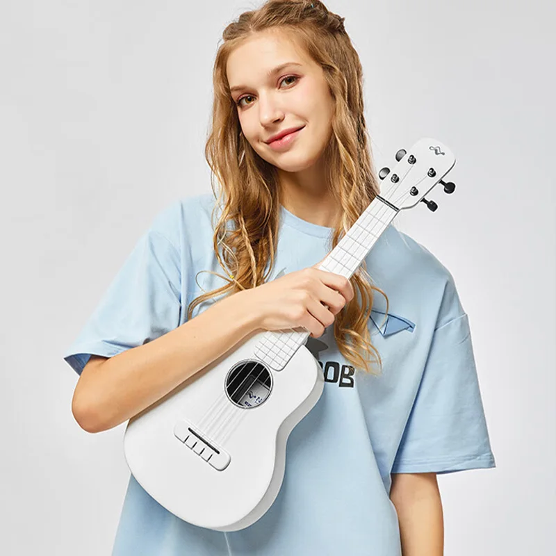 Ukelele de concierto TOM para niños adultos principiantes Ukelele de viaje de fibra de carbono de 23 pulgadas con kit para principiantes con bolsa, selección, correa y cuerdas.