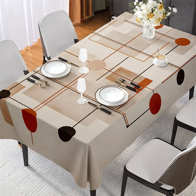 Soft, fashionable and beautiful tablecloth with geometric lines on a light white background and orange-brown polka dot pattern.