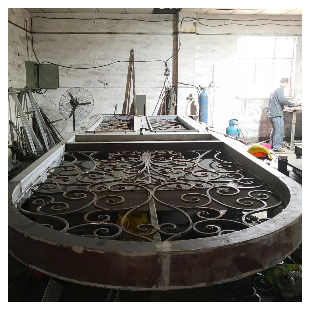 

Wholesale Metal Arch Accordion Top Double with Glass Modern Iron Doors Pakistan Iron Entrance Door For Home