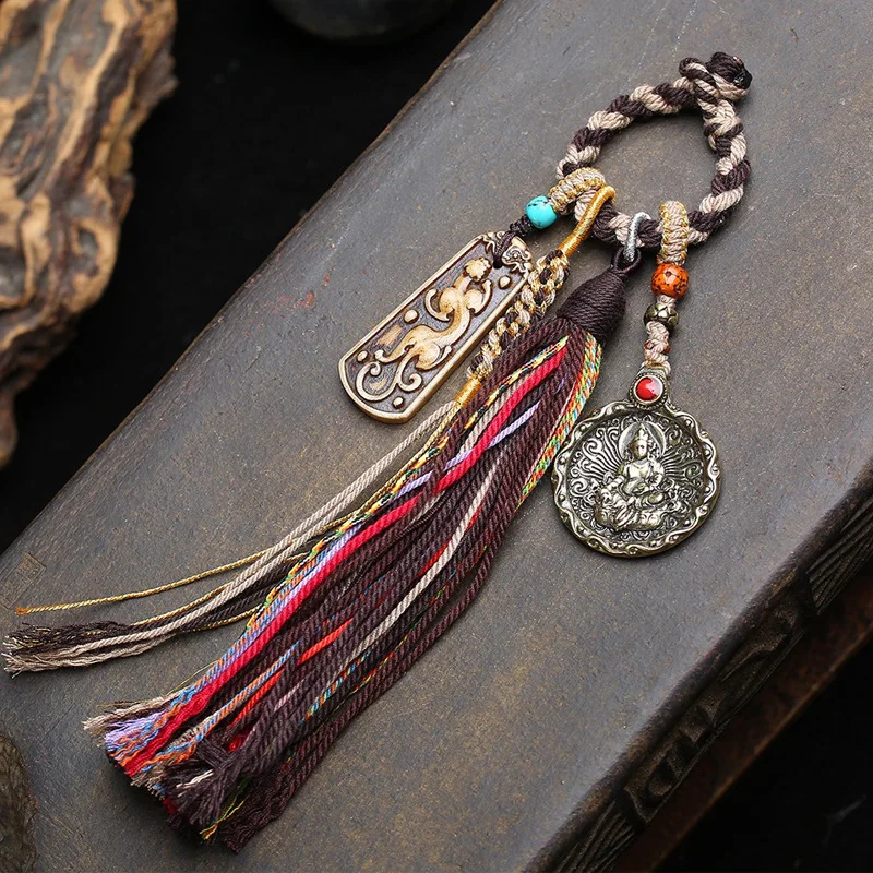 Tibetan old sky iron yellow God of Fortune copper wrapped pendant pendant reflux bone brave hand-woven rope pendant
