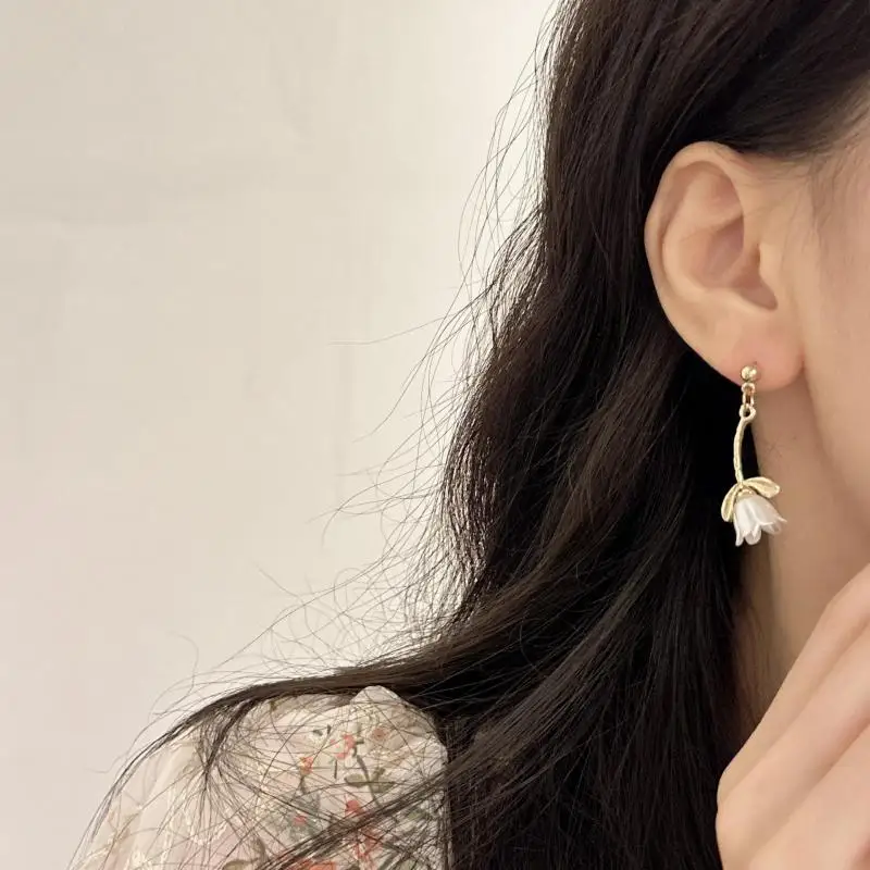 925 Silver Needle Korean Edition Earrings With Bell Orchid Flower Pearl Tassels Asymmetric Super Immortal Design Sense Earrings