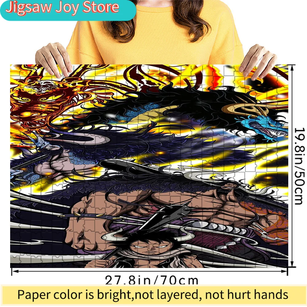 

Premium Paper Jigsaw Puzzle Featuring One Piece Kaido and Monkey D. Luffy in Gear 5 Nika Form Epic Battle Artwork with Fiery Fla