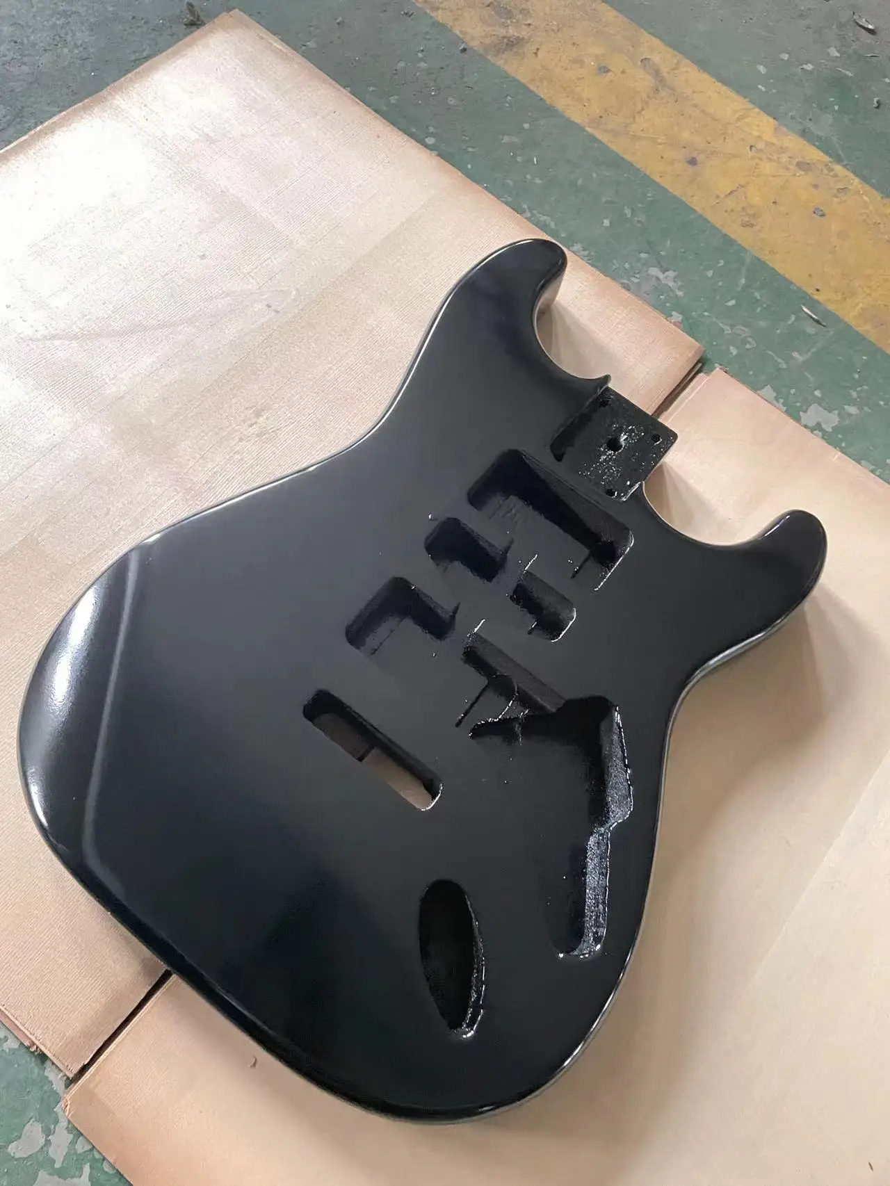 The black glossy guitar panel is an ST style electric guitar with a half empty heart barrel DIY guitar. The colored guitar body