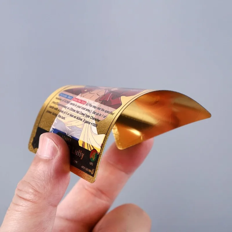 การ์ดวันพีซภาษาอังกฤษแบบฟอยล์สีทอง 55 ชิ้นใหม่ ชุดการ์ดสะสม Sailing Road Flying Kid Solon Gold Card Riman Peripheral