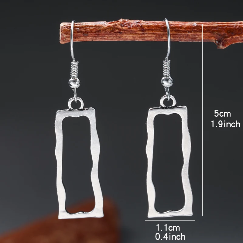 أقراط متدلية بنمط حلزوني عتيق ، مجوهرات بلون فضي ، شكل هندسي ، طراز بوهيمي عتيق ، تذكار سياحي عصري