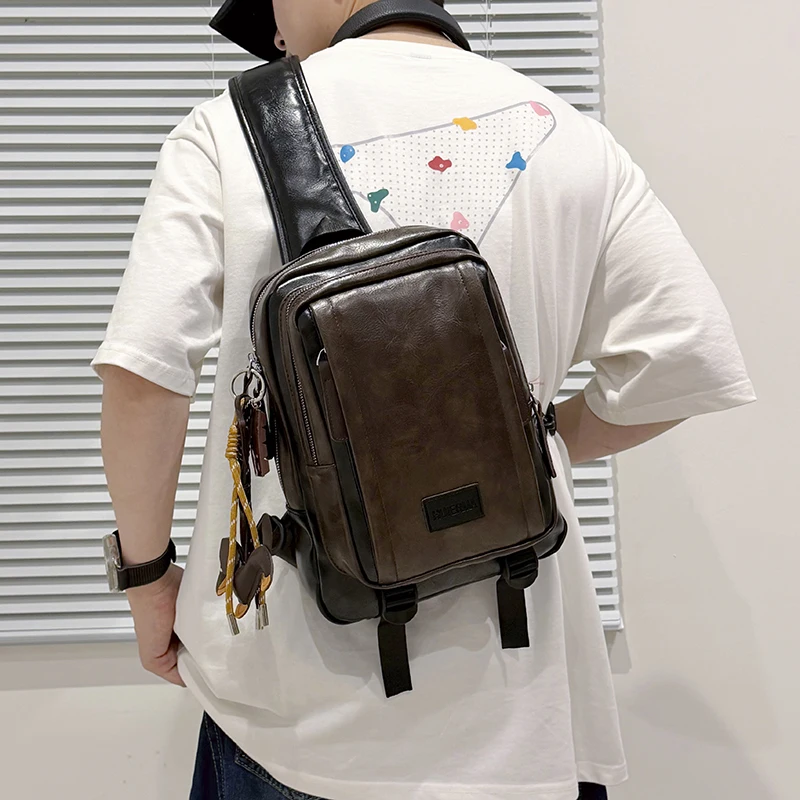 レトロ大容量チェストバッグメンズ韓国スタイルクロスボディストリートファッションクール旅行防水puレザー小型バックパック