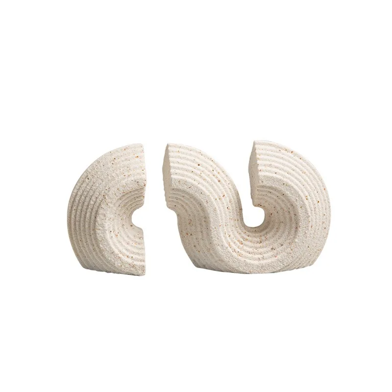 

Minimalist wabi-sabi style sandstone texture curve between boards ornaments office desktop creative book files