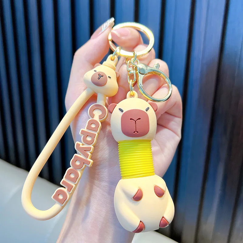Creative Capibara retractable key chain creative cartoon car students school bag pendant couple of small gifts