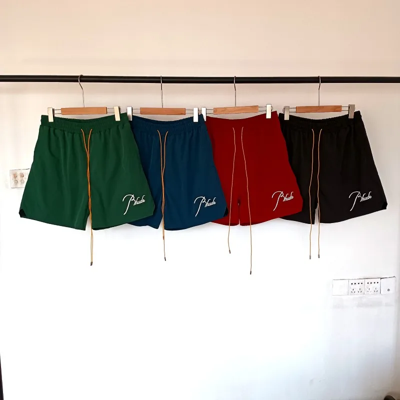 

New Vintage Style Rhude Elastic Waist Swim Shorts Men's Quick Dry Beach Shorts with Side Script Print Fast Delivery