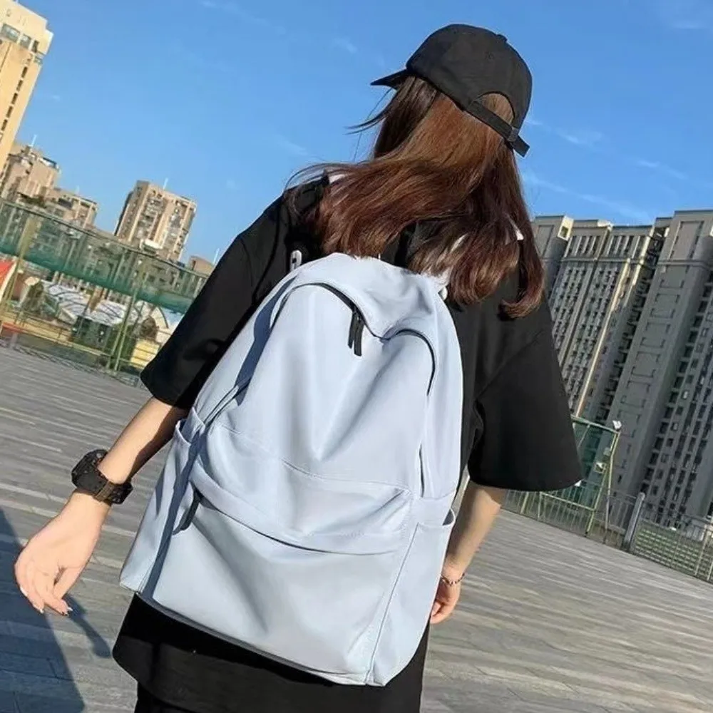 Tas Ransel Siswa Modern Kapasitas Besar Bahan Nylon Kasual Warna Solid Tali Dapat Disesuaikan Tas Travel Sekolah