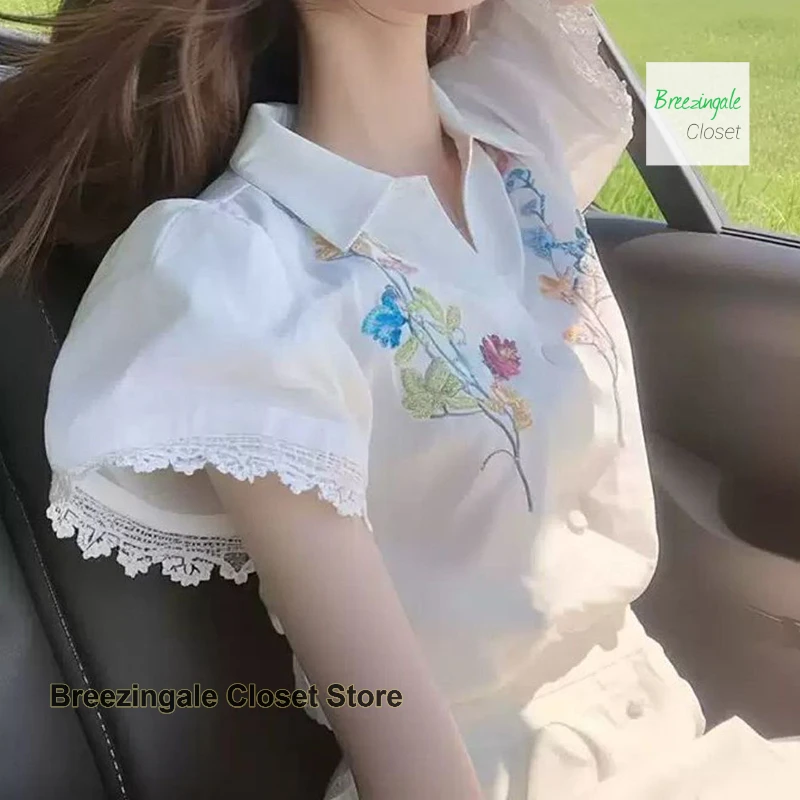 French high-quality white embroidered printed bubble sleeve shirt female summer unique beautiful niche fashionable sweet top.