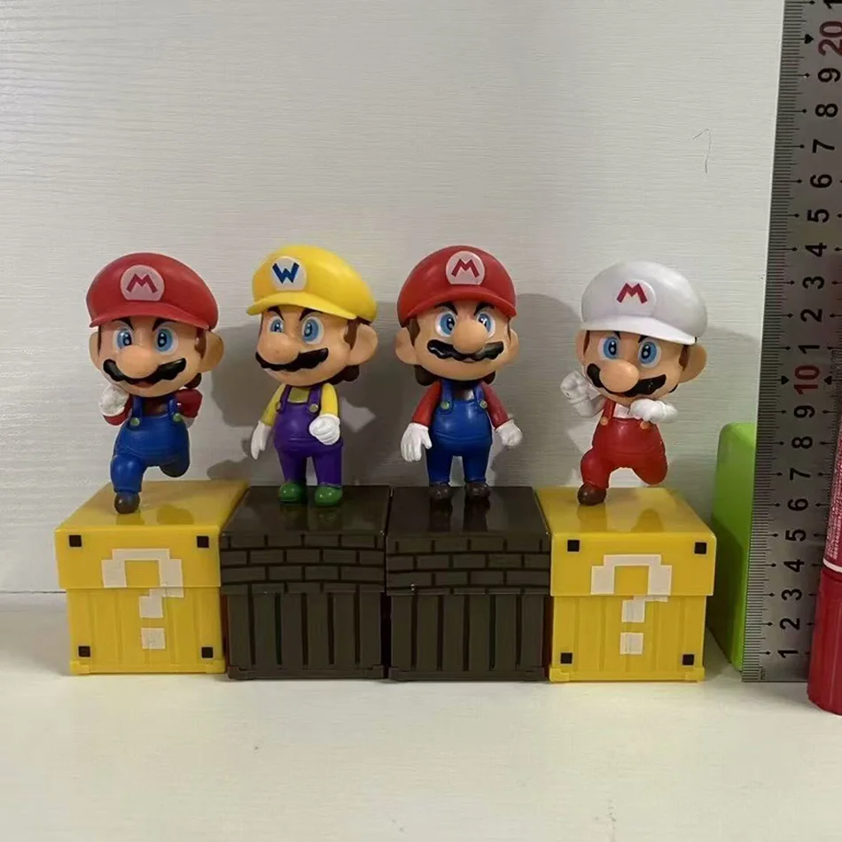 

4pcs/set Super Mario Bros Action Figures Mario Wario Model Toys with Question Block Bricks for Kids Collection Gift