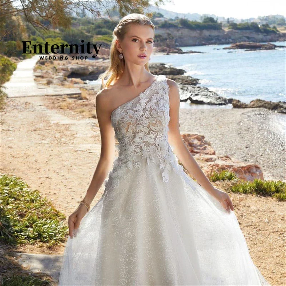 Personalizado uma linha de renda applique vestido de casamento um ombro até o chão sexy sem mangas vestido de noiva 2024 vestidos de novia