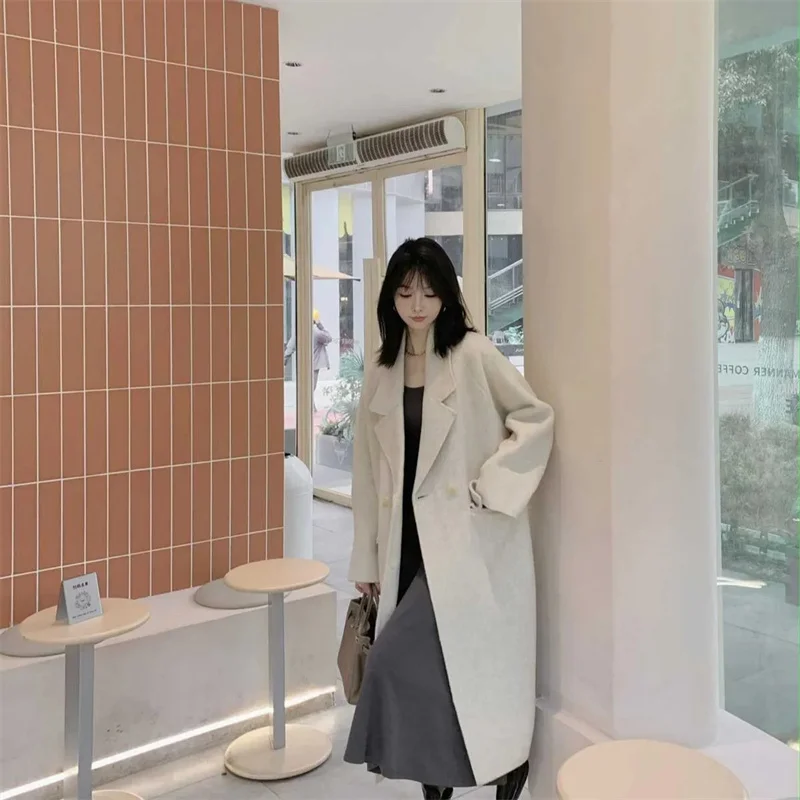 2026 Cappotto di lana con petto abbassato da donna autunno 2026 Moda stile sciolto Abbigliamento invernale da donna Cappotti lunghi Top