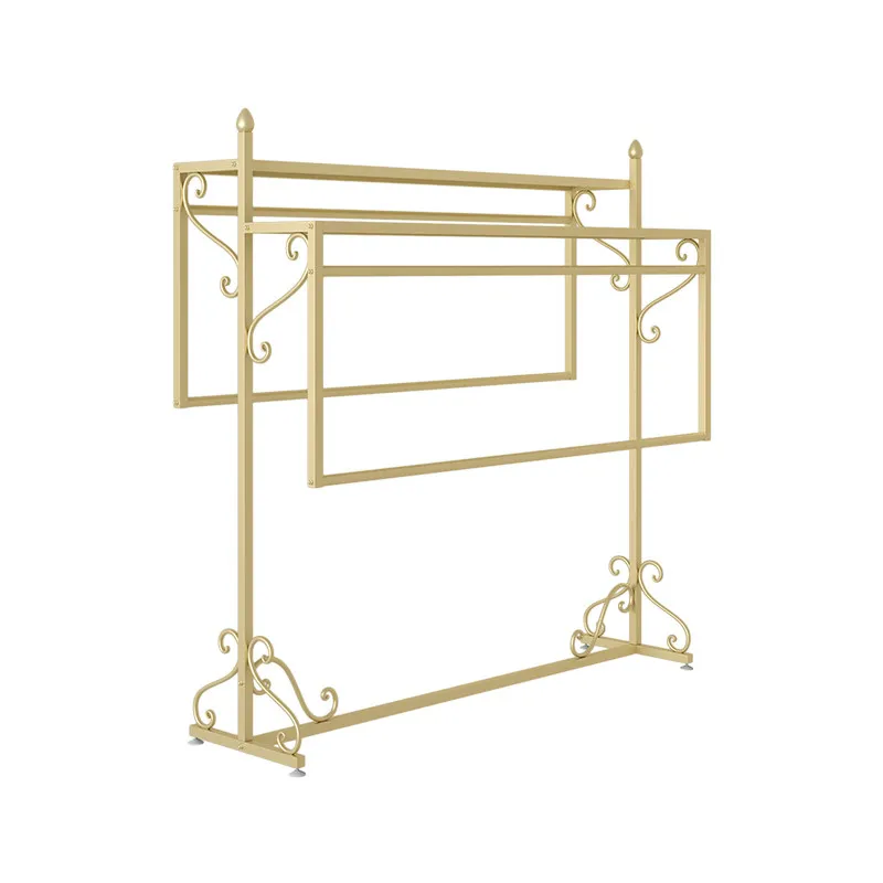 Floor standing combination men's and women's clothing store shelves with double row hanging racks in the middle