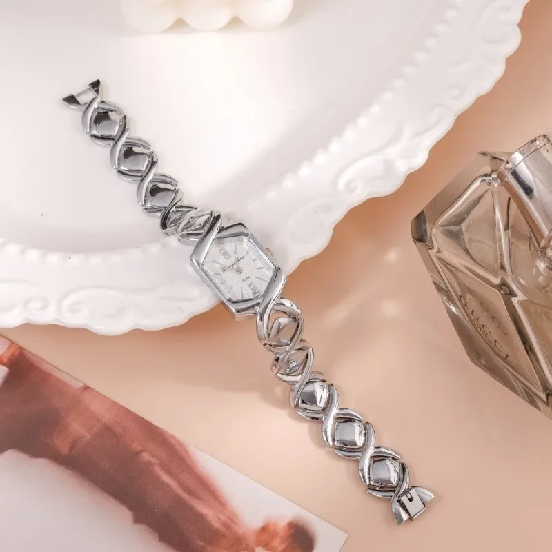 الحد الأدنى المرأة ساعة كوارتز الأرقام الرومانية سبائك الزنك حزام (استيك) ساعة تصميم الأزياء الفاخرة تنوعا نموذج الساعات النسائية الأنيقة