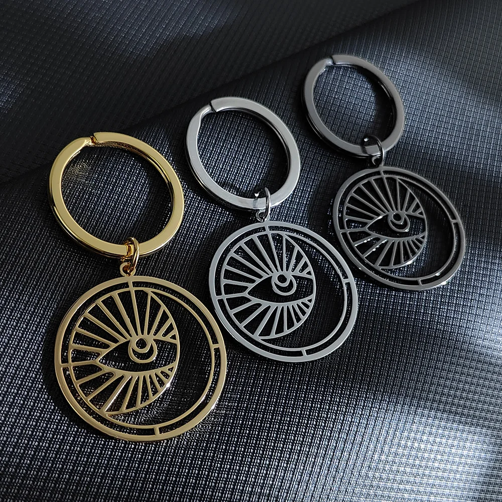 

Creative Lines Wisdom Eye Hollow Gold Plated 18K Stainless Steel Pendant, Waterproof and Fading Keychain, School Bag Pendant