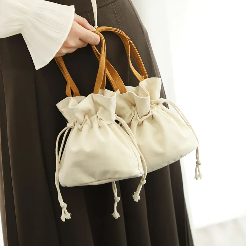 Custom Printed Logo Solid Color Canvas Bag Simple Drawstring Hand Carry Mini Mobile Phone Bag Key Storage Bags for Women
