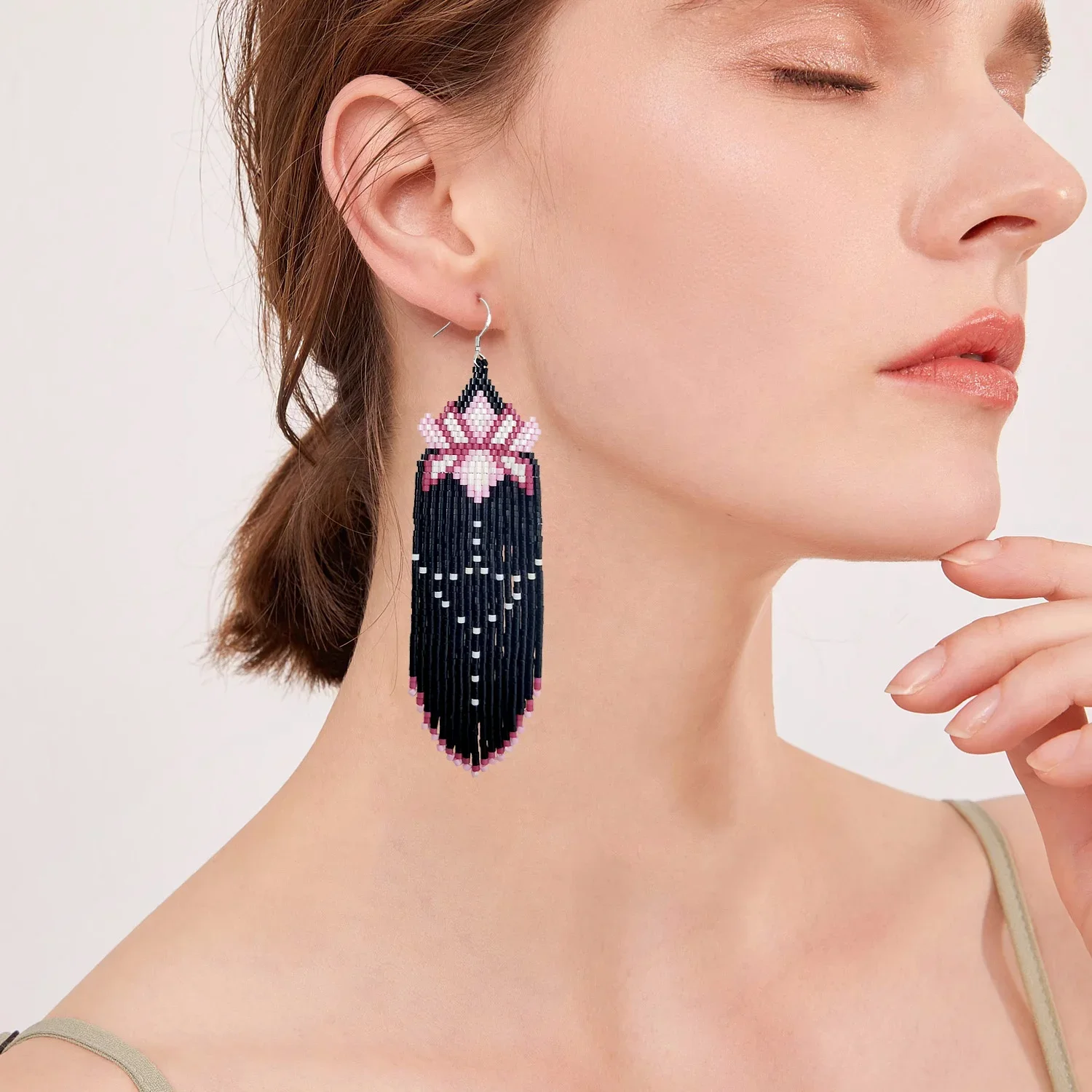 

Beaded earrings Tassel Flowers Design Originality Hand knitting Bohemia Alloy Tide Female Black Simple Rice bead earrings