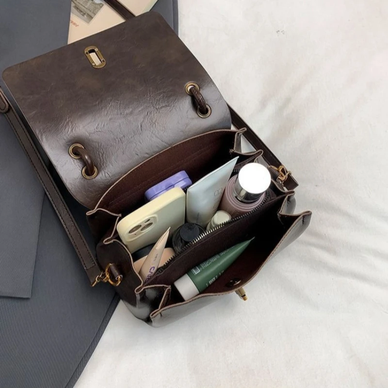 حقيبة كروس متخصصة راقية للنساء النسخة الكورية العصرية الجديدة حقيبة ساعي البريد حقيبة يد نسائية أجنبية متعددة الاستخدامات