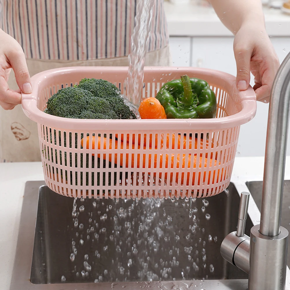 

Durable Pink PP Material Washing Drain Basket Fruit Storage Holder With Fast Draining Holes And Smooth Edges For Kitchen Use
