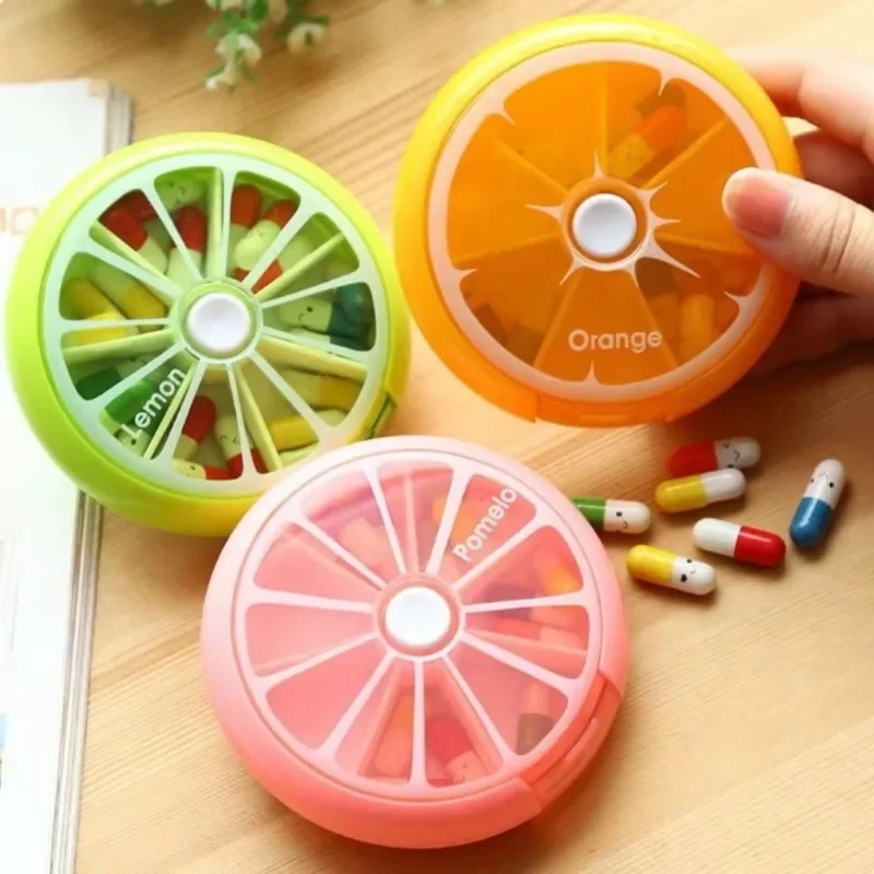 1PC Round fruit shape seven compartments rotating portable mini pill box storage box