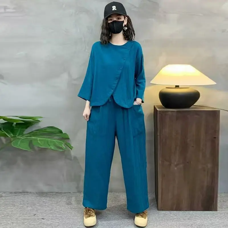 ชุดเซ็ตสองชิ้นสไตล์จีนสำหรับผู้หญิง ฤดูใบไม้ร่วงปี 2025 เสื้อแขนเจ็ดส่วนแฟชั่นลำลอง กางเกงฮาเร็มทรงหลวม