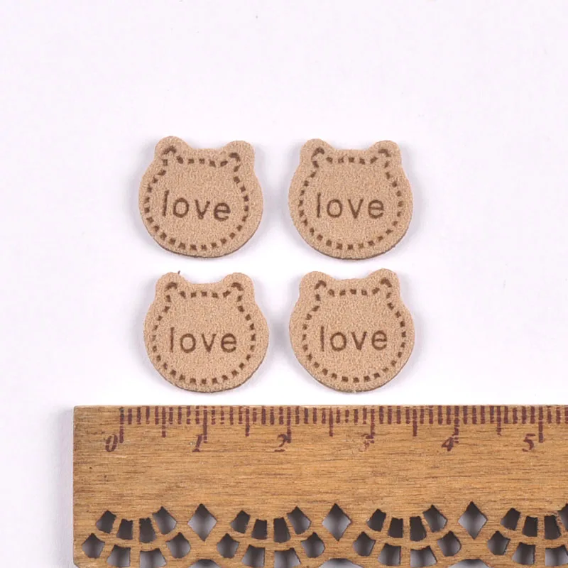 50Pcs Love Letter Cat Embossing Leather Labels For Clothes Sewing Accessories Garment DIY Crafts Supplies Kid Hats Shoes Tags