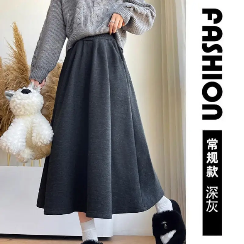 กระโปรงทรงเอไลน์สีข้าวเหนียวสีขาวข้าวโอ๊ต กระโปรงทรงเอไลน์ยาวปานกลางสำหรับผู้หญิง กระโปรงทรงเอไลน์ทรงร่ม สำหรับฤดูใบไม้ร่วงและฤดูหนาว กระโปรงลำลองเอวสูงสำหรับผู้หญิง สไตล์สบายๆ