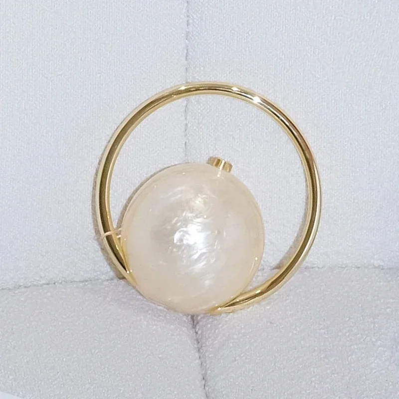 

Ring geometric spherical pearlescent acrylic clutch bag