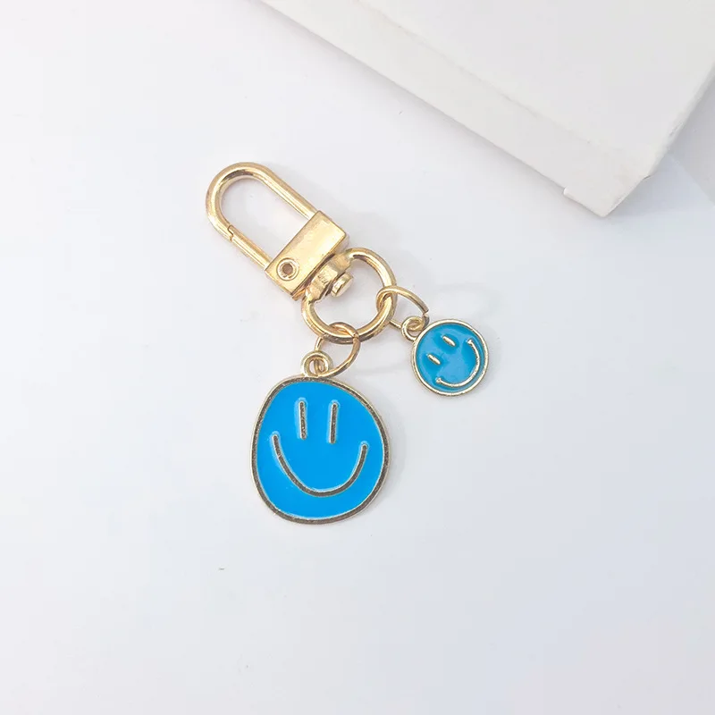 Hot Sale New Models 6 PcsCute Smile Face Keychain Yellow Pink Blue Black Enamel Metal Key Ring Bag Accessories For Women