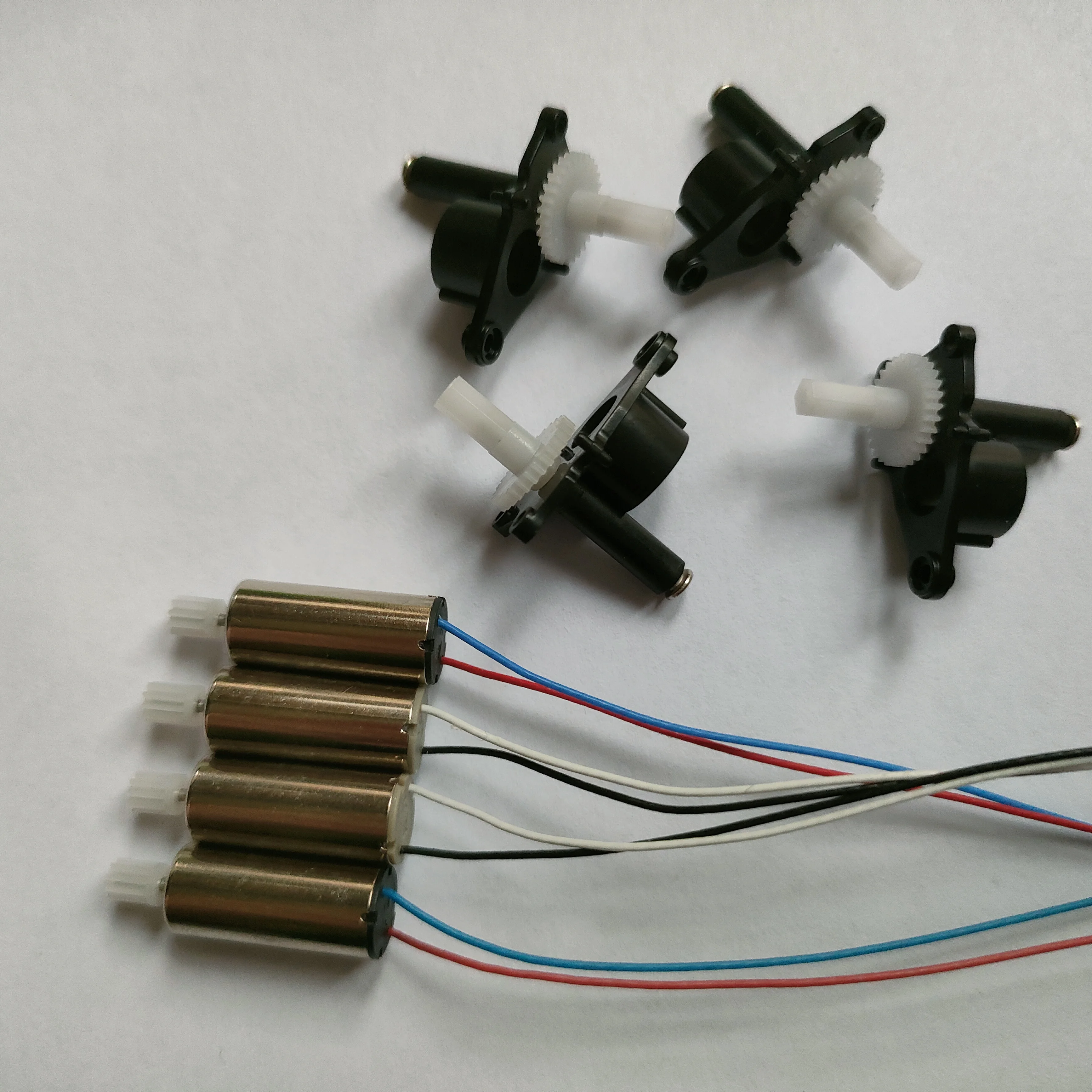Syma-piezas de repuesto originales X26, Motor CW CCW, engranaje de plástico pequeño, alas de hélice, pieza de marco de Motor apto para Dron X26 X26A X100